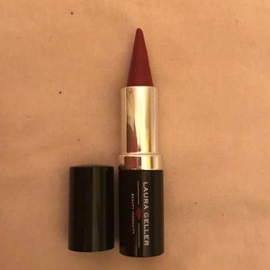 Laura Geller cone lipstick in Signature red. Full